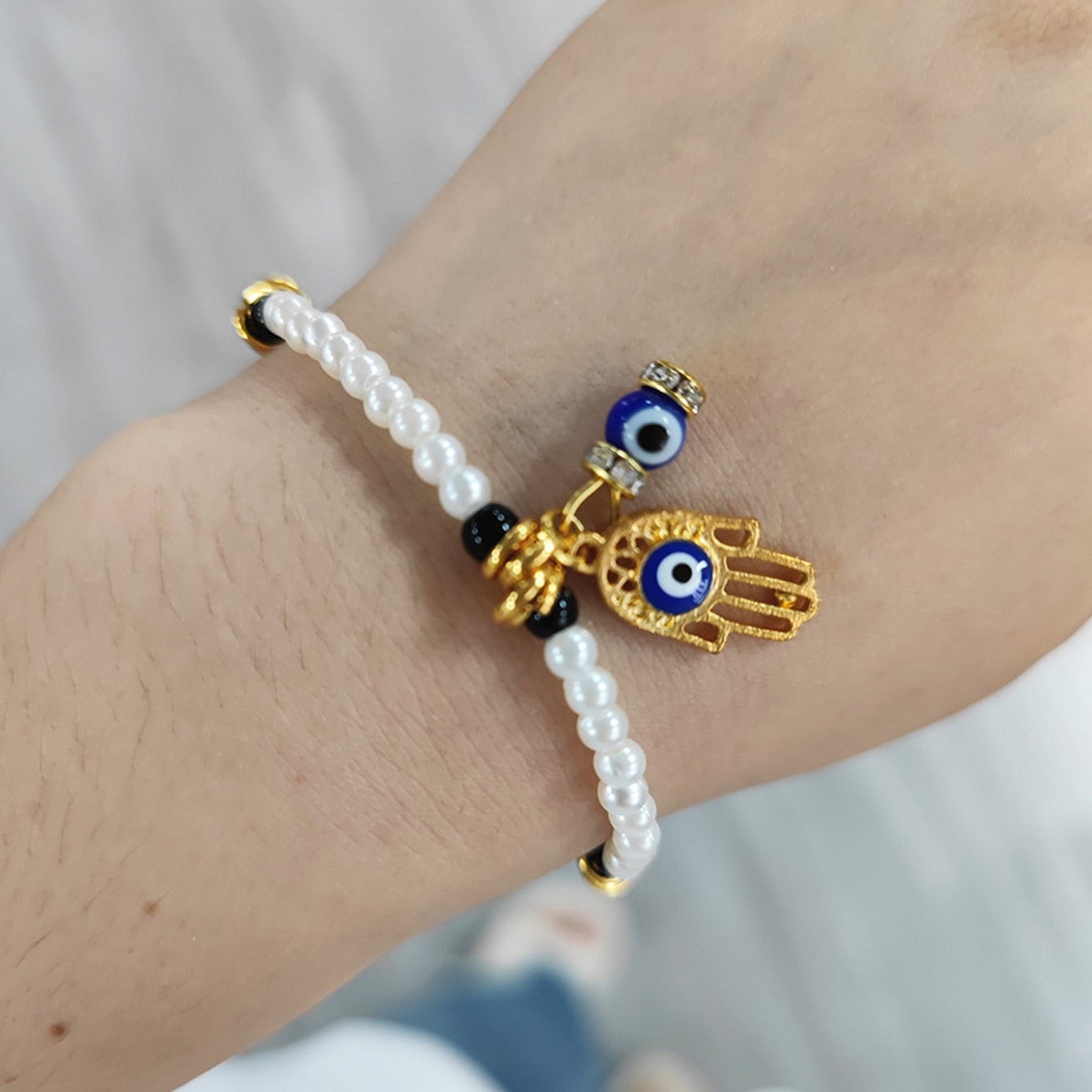 Golden Hamsa Hand Evil Eye Bracelet